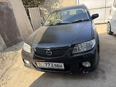 мустанг авто: Mazda 323: 2001 г., 2 л, Автомат, Газ, Универсал — 8
