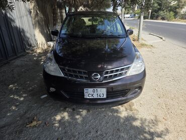 Nissan Tiida: 1.5 л | 2011 г. Хэтчбэк