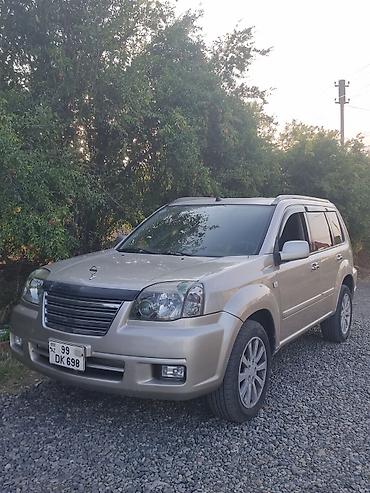 Транспорт: Nissan X-Trail: 2 л | 2004 г. Универсал — 3