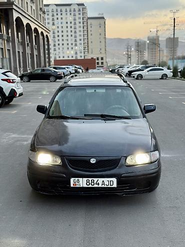 эсковатор продажа: Mazda 626: 1999 г., 1.8 л, Механика, Бензин, Универсал — 4