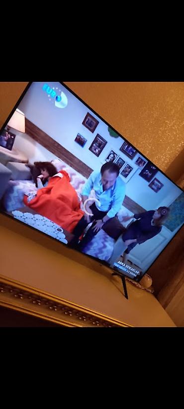 Smart TV – nazik çərçivə, iki ayaqlı dayaq, divara və ya tumbaya