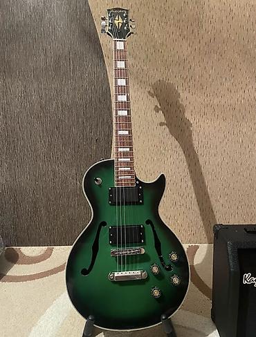 elektrik gitara: Salam les paul növlü elektro gitardır. Heçbir problemi yoxdu, set — 2