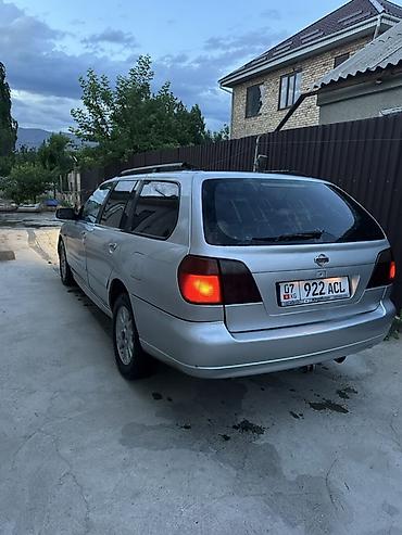 07 oturacaqlar: Nissan Primera Wagon – gümüş rəng, universal kuzov Xüsusiyyətlər: - — 2