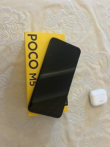 macbook m5: Poco M5, 128 GB, rəng - Qara, Barmaq izi — 2