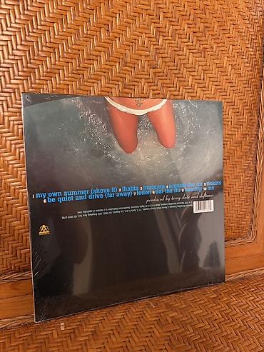 mx 49: Məhsul: Deftones – “Around the Fur” vinil plağı Təsvir: - Format: 12" — 2