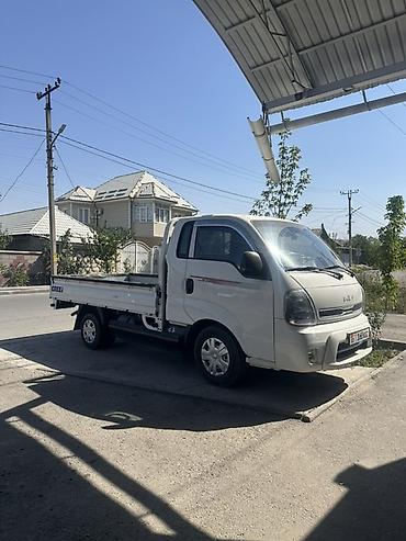 kia bongo: Kia Bongo III (K2500/K2700) бортовой малотоннажный грузовик, белый — 3