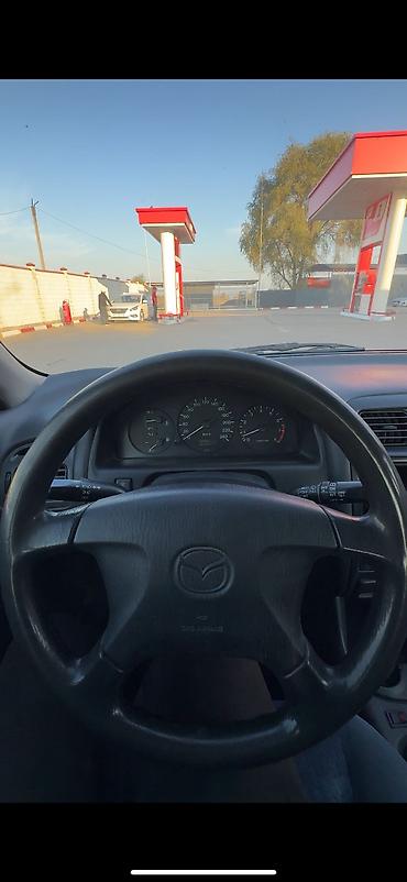 260: Mazda 626: 1997 г., 1.8 л, Механика, Бензин, Хэтчбэк — 7