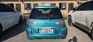 калганы: Mazda Demio: 2003 г., Автомат, Бензин — 10