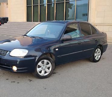 disk masin: Hyundai Accent sedan - Kuzov: 4 qapılı sedan, tünd mavi rəng - — 6