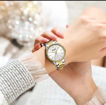 Qol saatları: Qadın saatı 
Curren — 10