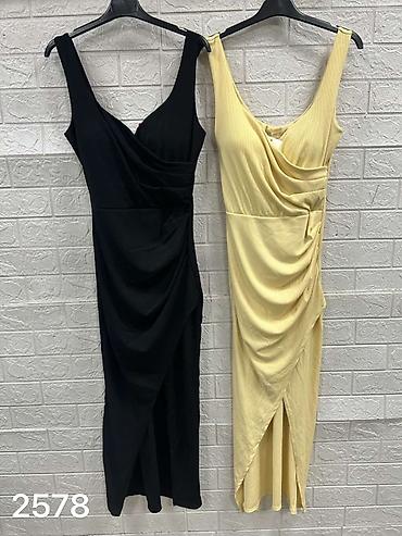 nitima: Elegantna midi haljina sa preklopom i prorezom
1900
Din
S M L — 7