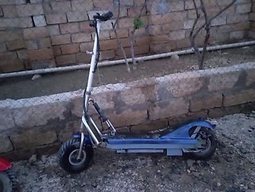 Электротранспорт: Elektrik skuter – şinləri iri ölçülü, möhkəm metal çərçivəli model — 1