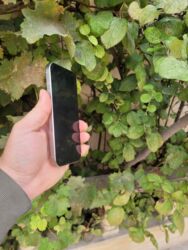 Apple iPhone: IPhone 15 Pro, 128 GB, Natural Titanium, Face ID — 13