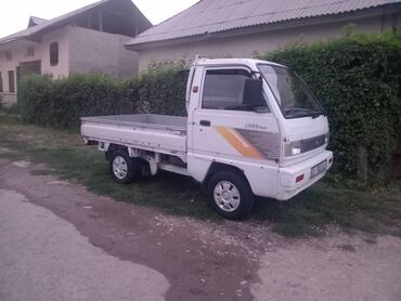 сканер для авто: Белый грузовой автомобиль Daewoo Labo с открытым кузовом и кабиной на