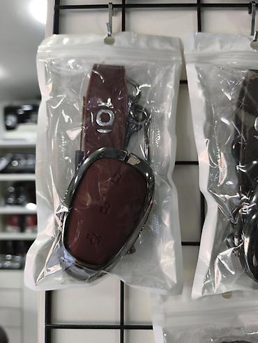 cixollar: Avtomobil açarı üçün dəri qoruyucu üzlük və asqı dəsti. - Material — 1