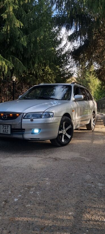 домкрат для авто: Mazda 626: 2000 г., 2 л, Механика, Бензин, Универсал