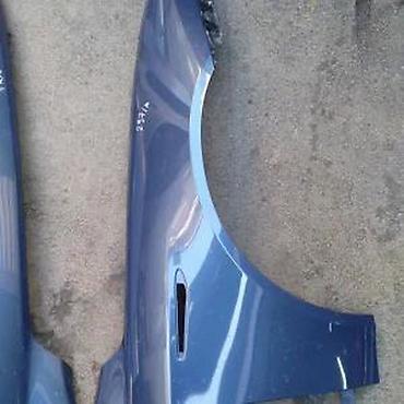 Karoserija: Alfa Romeo 159 desno krilo kod boje 297/A. Alfa Romeo 159 desno krilo — 1