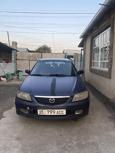 kia geed: Mazda 323: 2001 г., Хэтчбэк — 4