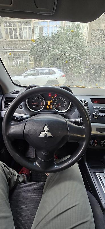 x 5: Mitsubishi Lancer: 2011 г., 1.5 л, Автомат, Бензин, Седан — 6
