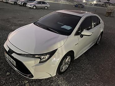 roewe ei5: Toyota Corolla: 2019 г., 1.8 л, Автомат, Гибрид, Седан — 1