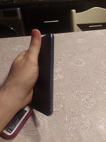 Мобильные телефоны: Samsung Galaxy A52, 128 ГБ, цвет - Голубой, Отпечаток пальца — 6