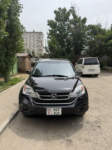 митсубиси лансер: Черный кроссовер Honda CR-V. Автомобиль с просторным салоном и