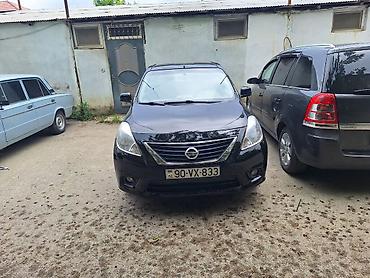 2012 07: Nissan Sunny: 1.5 l | 2012 il Sedan — 3