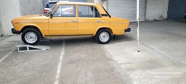 VAZ (LADA): VAZ 2106, sarı rəngli sedan Müəssisə: VAZ Model: 2106 (klassik — 5