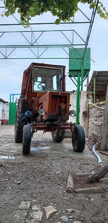 yto traktor lizinq: T 25 traktorçu. Xadavoyu hec bir xerc teleb etmir. Qoşqu və ot yiğan