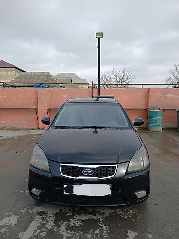 Kia: Kia Rio – hetçbek, qara rəng Xüsusiyyətlər: - Kuzov: 5 qapılı — 8