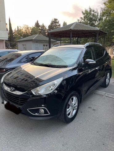 Hyundai ix35: 2.4 л | 2013 г. Внедорожник