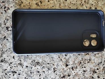 irşad redmi note 13: Məhsul: Qara rəngli telefon qabı - Model uyğunluğu: İki böyük + bir — 1