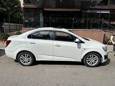 spark 2015: Chevrolet Aveo: 2014 г., 1.6 л, Механика, Бензин, Седан — 4