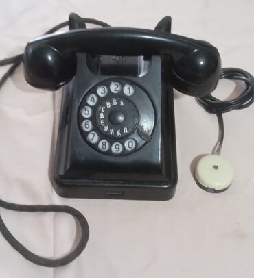 Donlar: Qedimi telefon, iwlek deyil. 70 man. Unvan Bayil