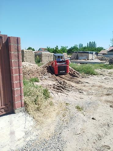 мини трактор услуга: Услуги мини-погрузчика TCM (skid steer) - Маневренный мини-погрузчик — 9