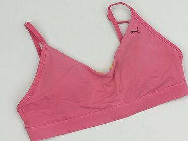 Ten damski biustonosz sportowy marki Puma w kolorze różowym to idealny