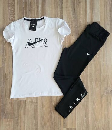 ženski kombinezoni za punije: Nike ženski komplet majica i helanke Novo Majica pamuk Helanke mokra