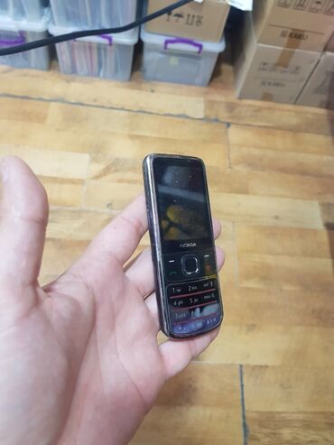 телефон fly nano 4: Nokia 6700 Slide, 4 ГБ, цвет - Черный, Гарантия, Кнопочный, С документами