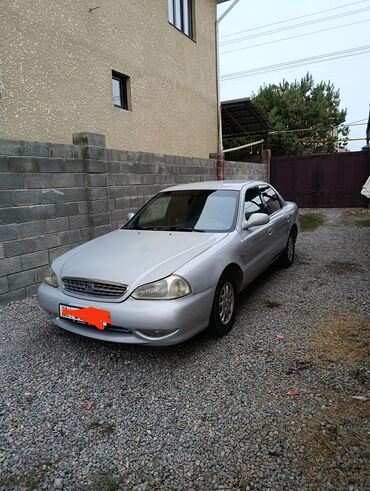 российский машины: Kia Clarus: 1998 г., 1.8 л, Механика, Бензин, Седан