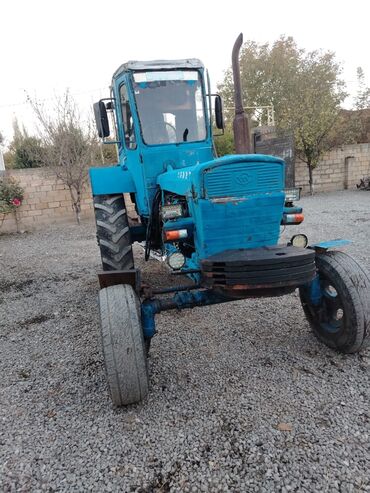 Traktorlar: Mavi rəngli tək kabinəli təkərli kənd təsərrüfatı traktoru - Güclü — 8