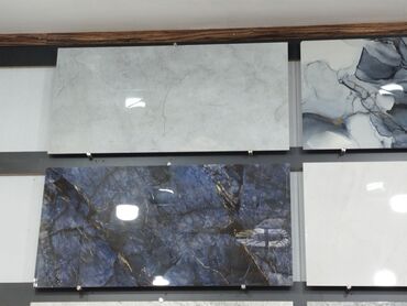 ozu yapisan panel: Mərmər naxışlı keramik plitələr – müxtəlif rəng və dizayn seçimləri -