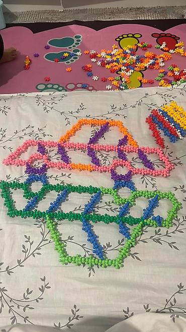 Модульные покрытия, пазлы: Конструктор «Снежинки» из разноцветных пластиковых деталей в одном — 15