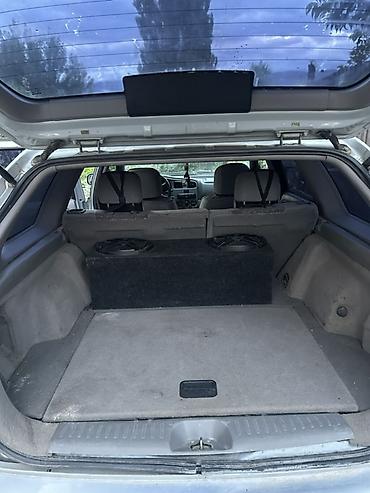 07 oturacaqlar: Nissan Primera Wagon – gümüş rəng, universal kuzov Xüsusiyyətlər: - — 10