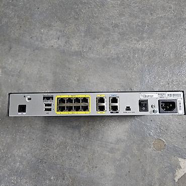 Модемы и сетевое оборудование: Маршрутизатор Cisco 1811 Полностью рабочий и сброшен до заводских — 2