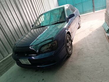 Другой тюнинг: Седан темно-синего цвета с аэродинамическим обвесом и заниженным — 9