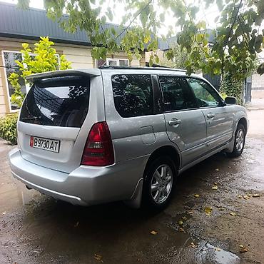 городской каток: Subaru Forester: 2002 г., 2 л, Автомат, Бензин, Кроссовер — 9