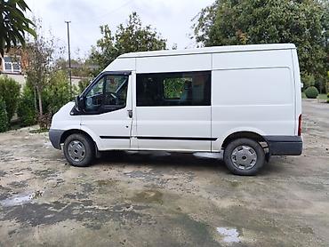 yer sumlayan traktor: Ford Transit: 2.4 l | 2006 il Van/Minivan — 4