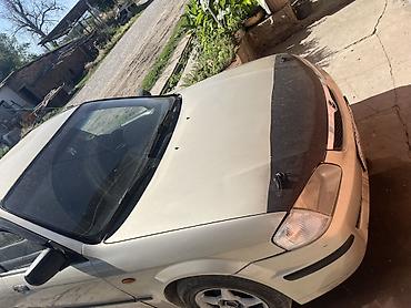 мотор нексия 1: Mazda 323: 1999 г., Седан — 3