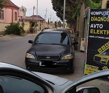mini cooper kreditle: Opel Astra Caravan (universał) – qara rəngdə, benzinli Xüsusiyyətlər — 2