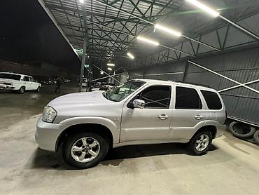 производитель ключей: Mazda Tribute: 2005 г., 2 л, Механика, Бензин, Внедорожник — 1